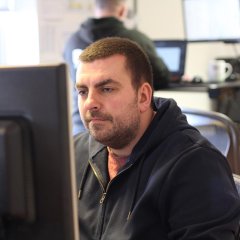 Steve working at his desk