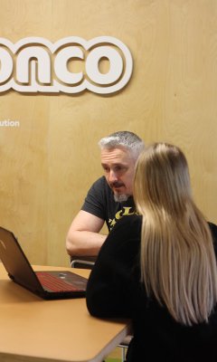 Adam in a meeting